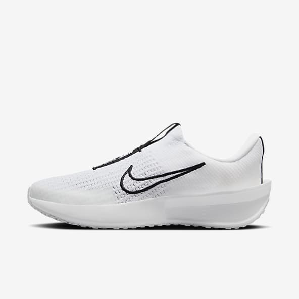 Nike slip on white shoes top